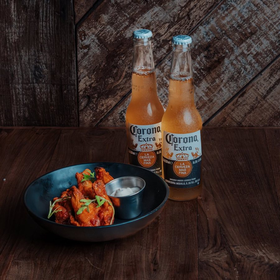 Wings with two bottles of beer
